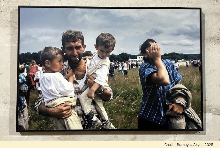 A family fleeing Srebrenica, carrying their children and an uncertain future.