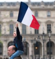 PHOTO CREDIT: A celebration outside the Louvre after Macron’s election victory in 2017. SOURCE: Photo by Lorie Shaull, via Flicker https://www.flickr.com/photos/number7cloud/34527195605 and Creative Commons license: https://creativecommons.org/licenses/by/2.0/