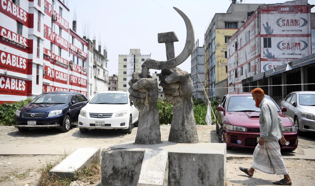 A monument to the victims of the Rana Plaza tragedy stands in front of the garment factory that collapsed on April 4, 2013. (Photo: Piyas Biswas)